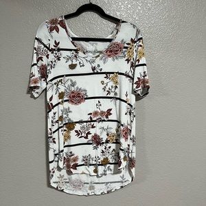 Maurice’s 24/7 size m cream with black stripes and floral designs